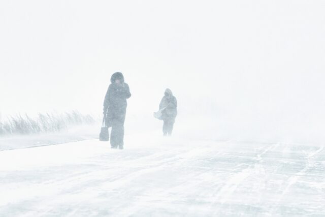 A blizzard with snow.