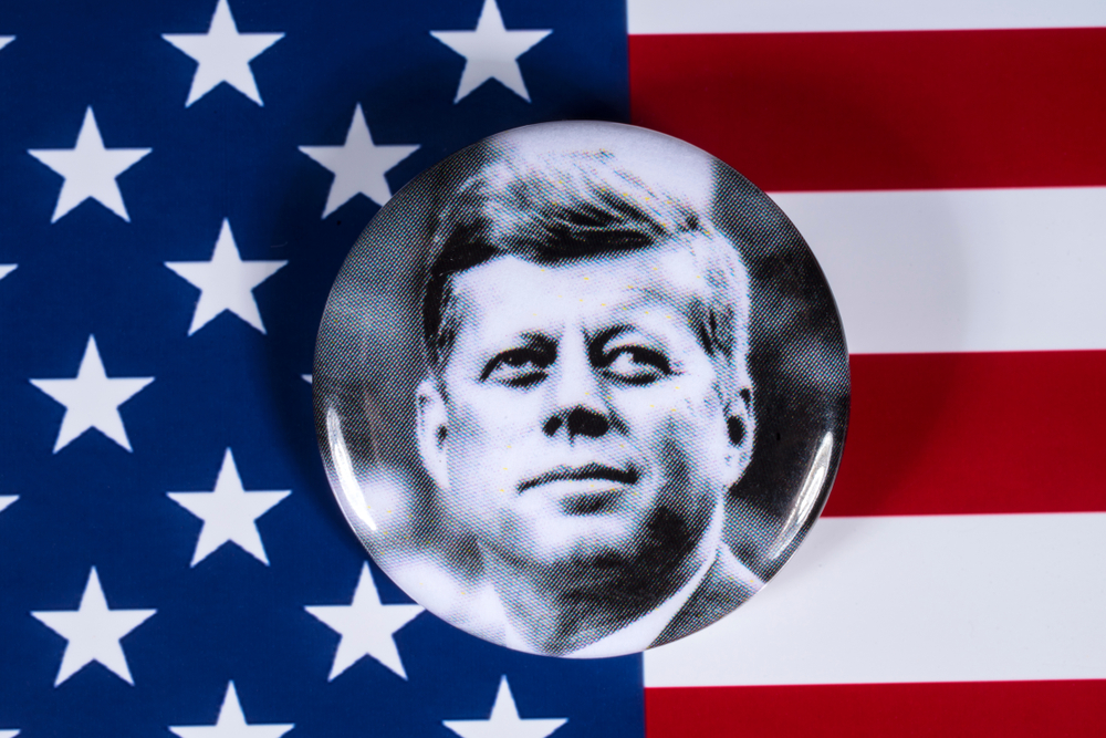 President John F. Kennedy's face on American flag.