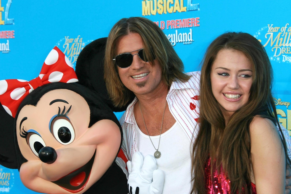 Miley and Billy Cyrus when she was a teen Disney star.