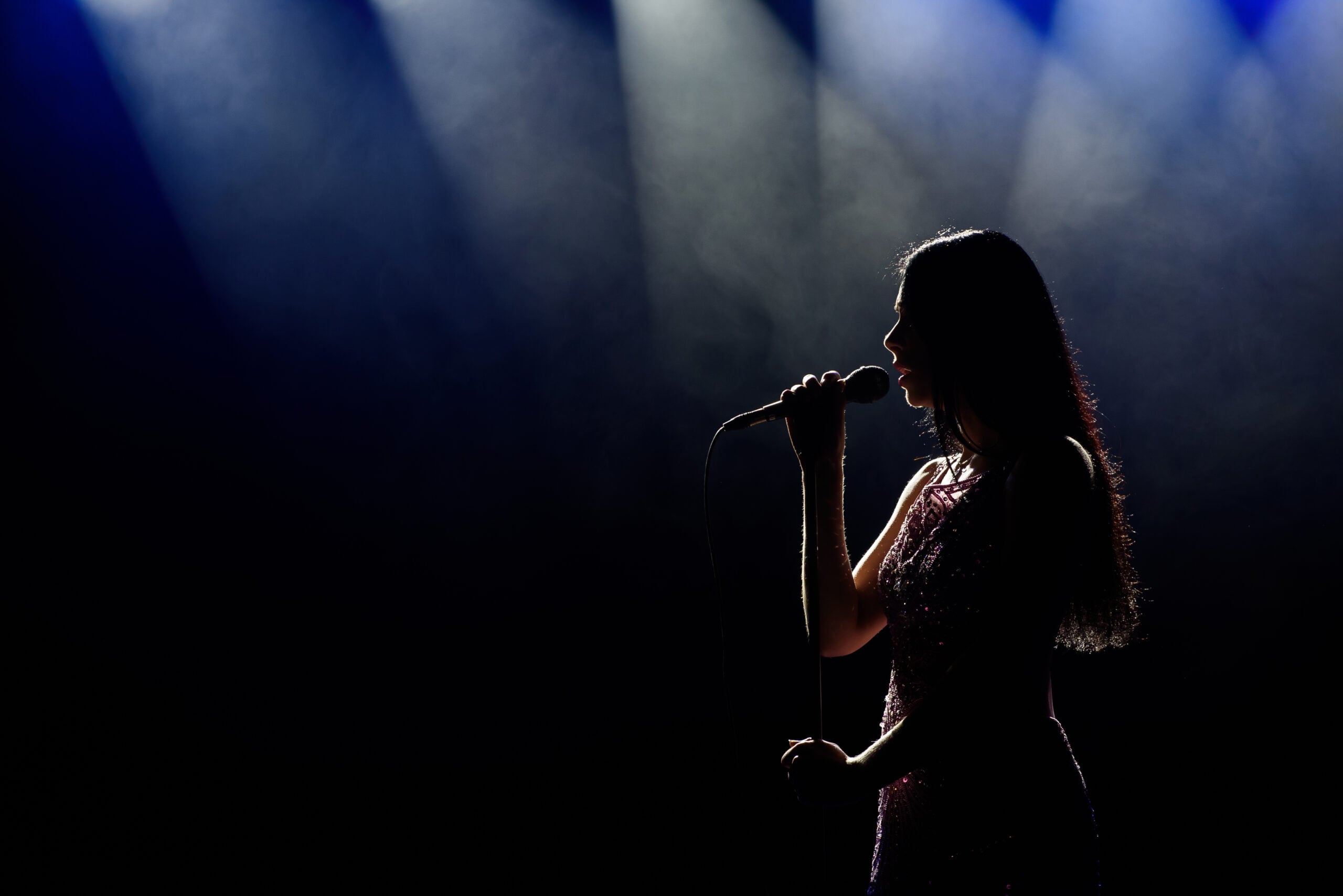 A female singer on stage. 