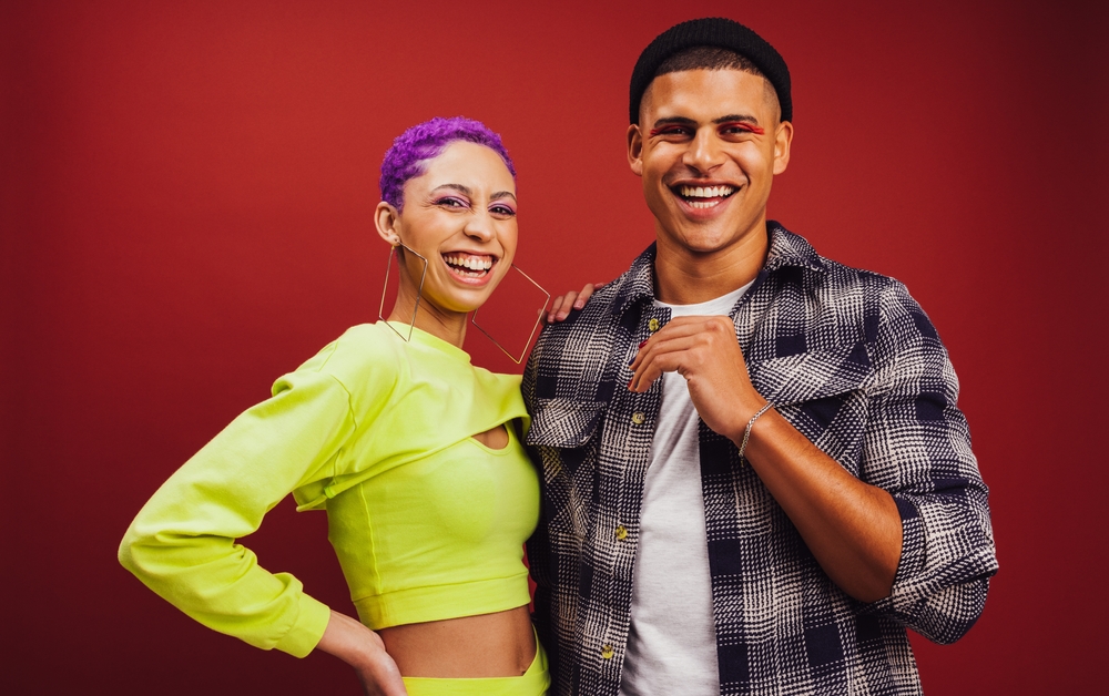 A young extroverted couple looking very happy