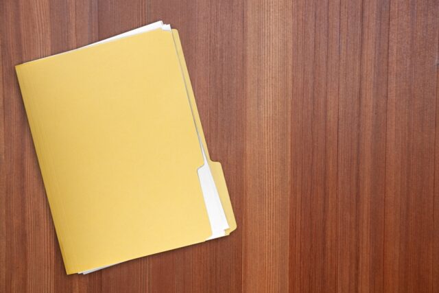 Manila folder with documents.