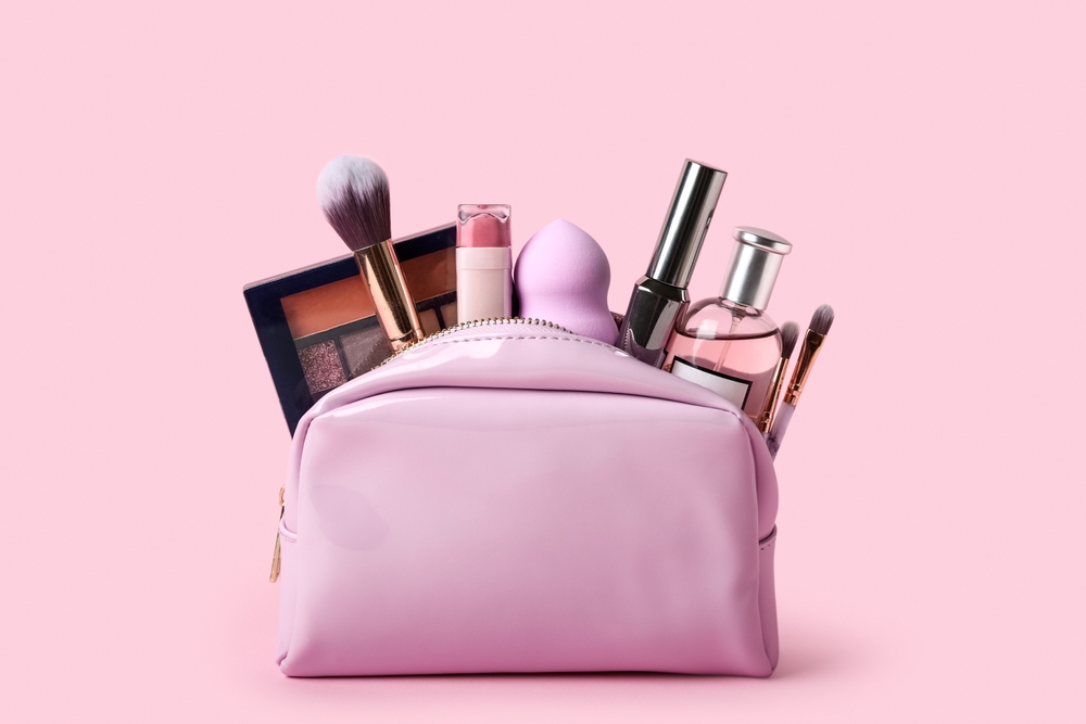 Cosmetic bag filled with beauty products and makeup