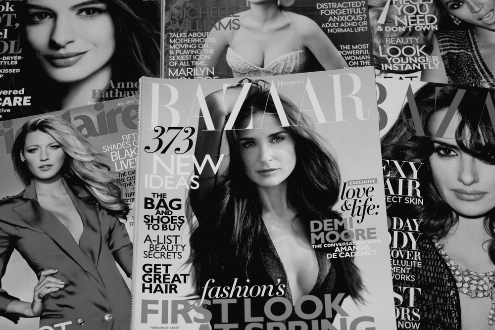 Montage of magazine covers with Demi Moore on front.