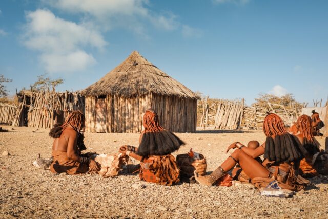 Group of Himba women in traditional attire.