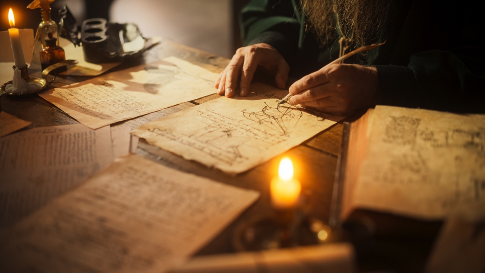 A man writing with a scribe.