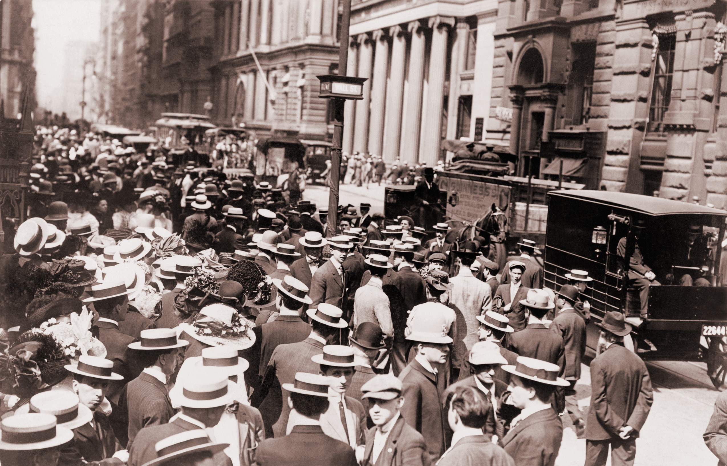 People walking on the street in New York Financial District.