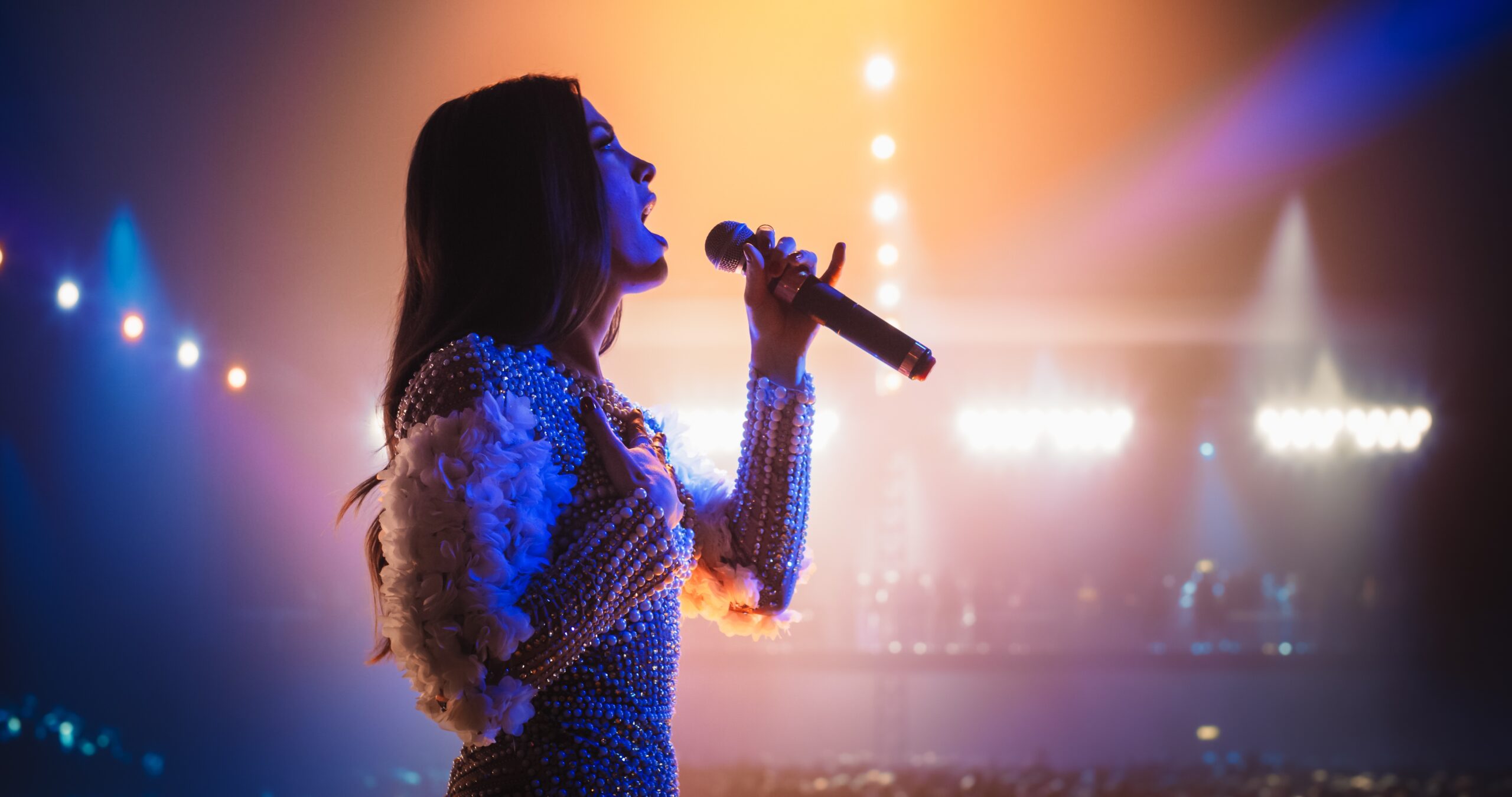 A female singer on stage. 