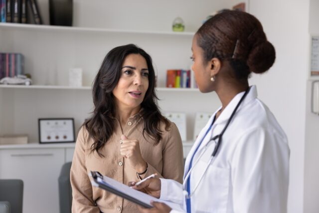Mature Woman having a consultation with doctor.