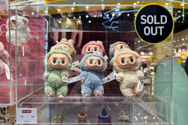 Labubu plush toys showcased with a SOLD OUT sign