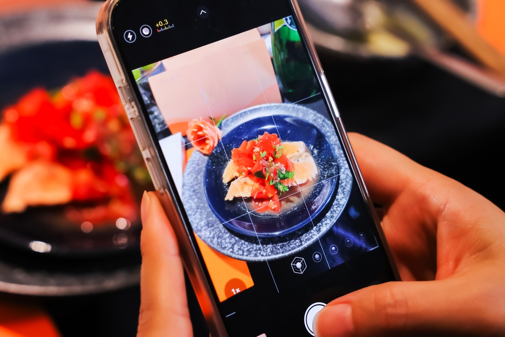 Using smart phone to take pictures.