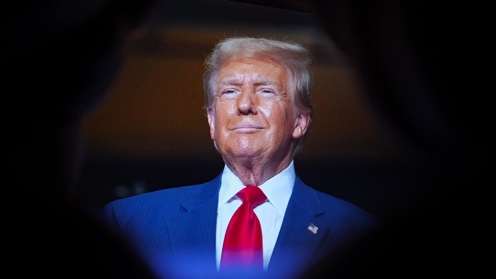 grinning Donald Trump