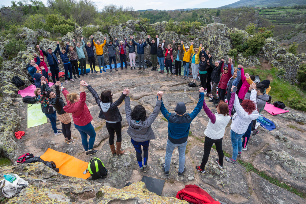 Group of people in nature who belong to a cult