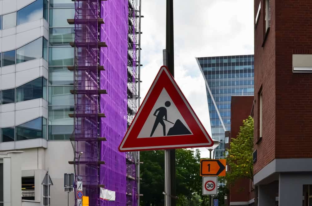 Traffic sign showing road works or maintenance is ongoing