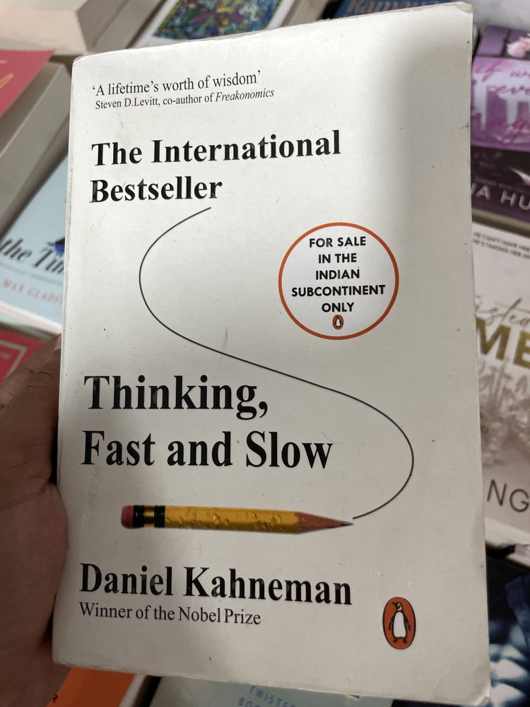 Thinking fast and slow by Daniel Kahneman