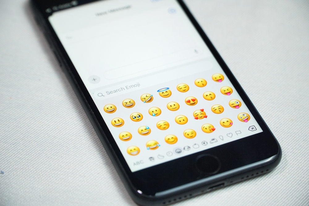 A smartphone showing emojis