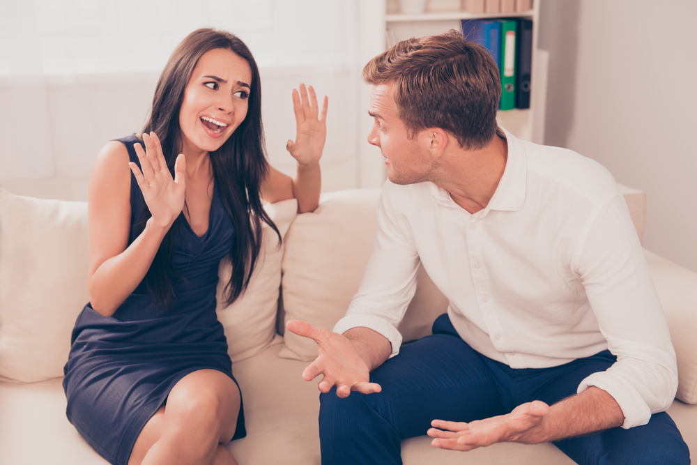 A beautiful young couple having a heated argument
