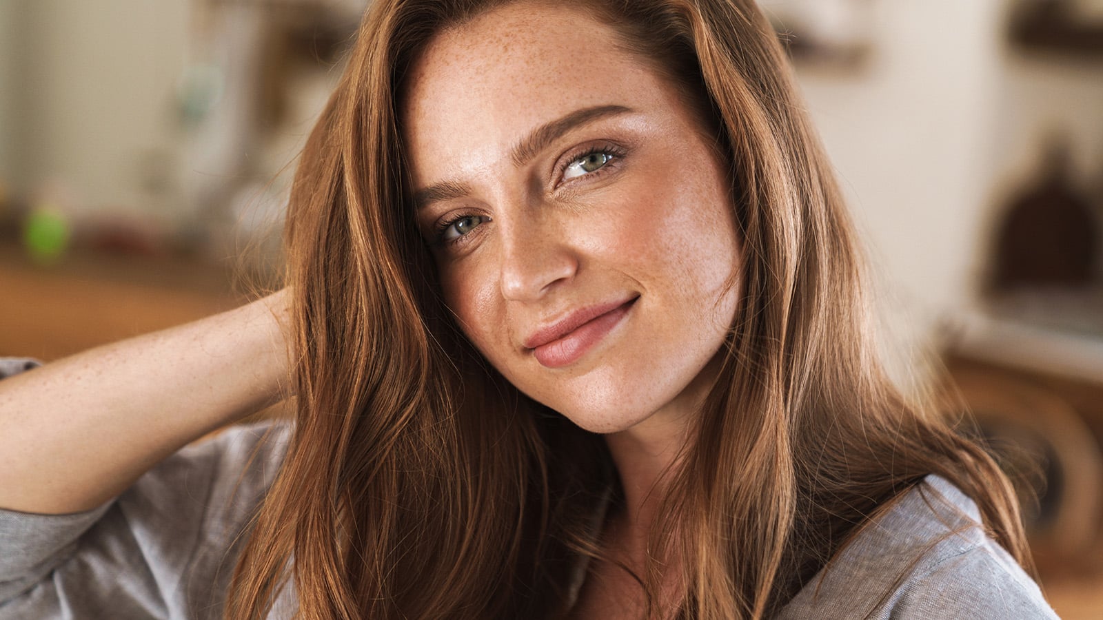 Confident young woman smiling.