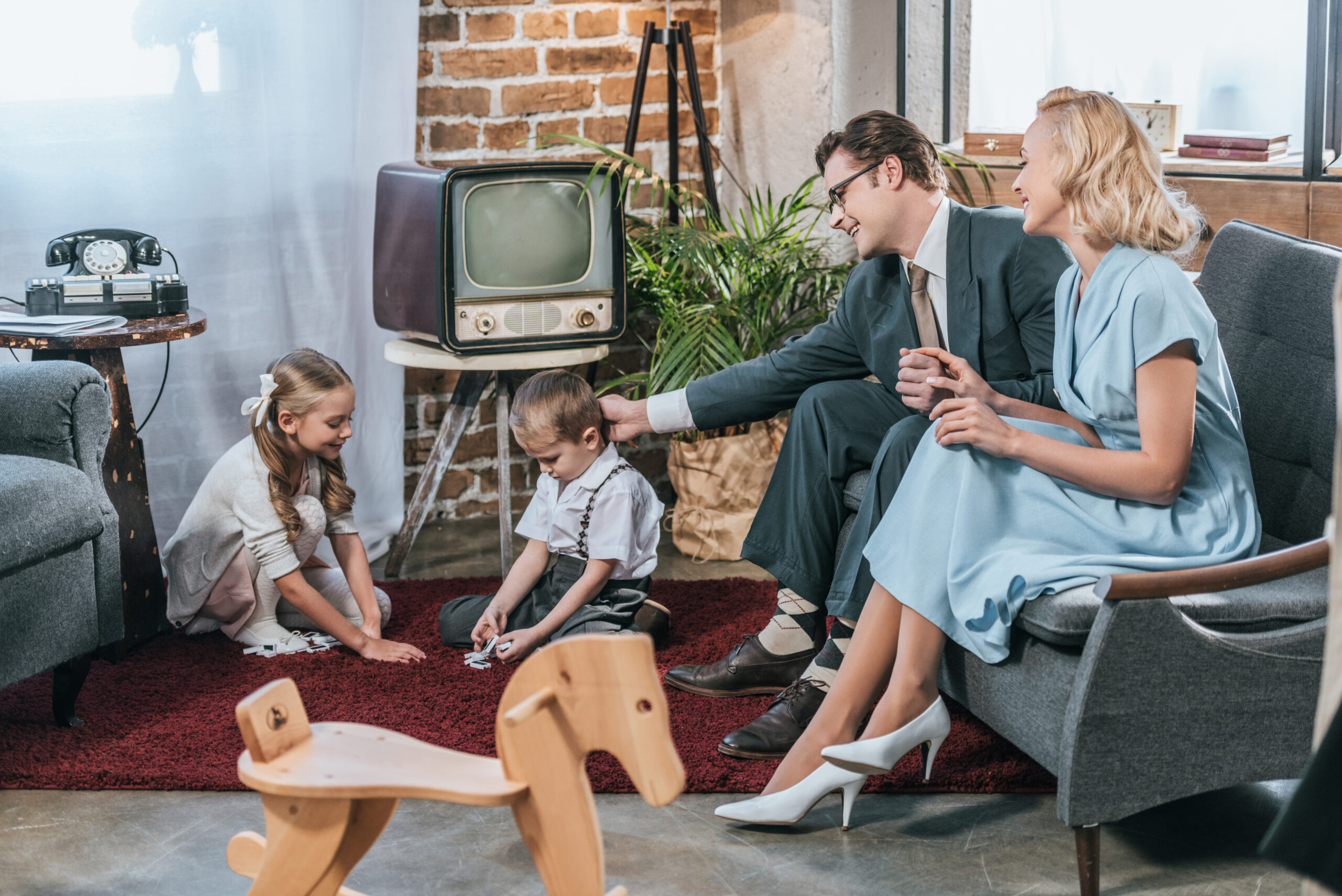 Retro scene of a family enjoying time together in their living room.