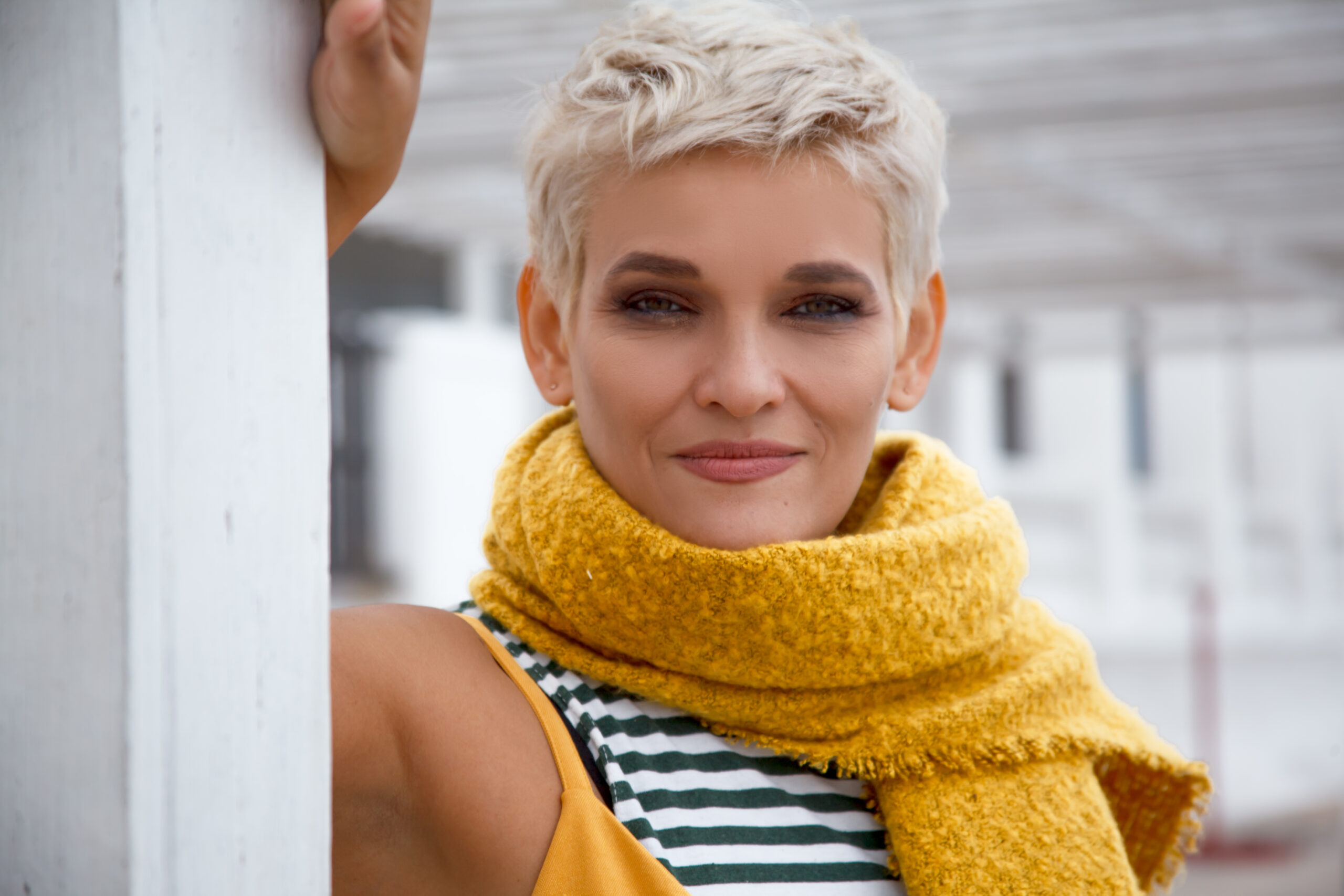 A 40 year-old woman looking confident on a walk.