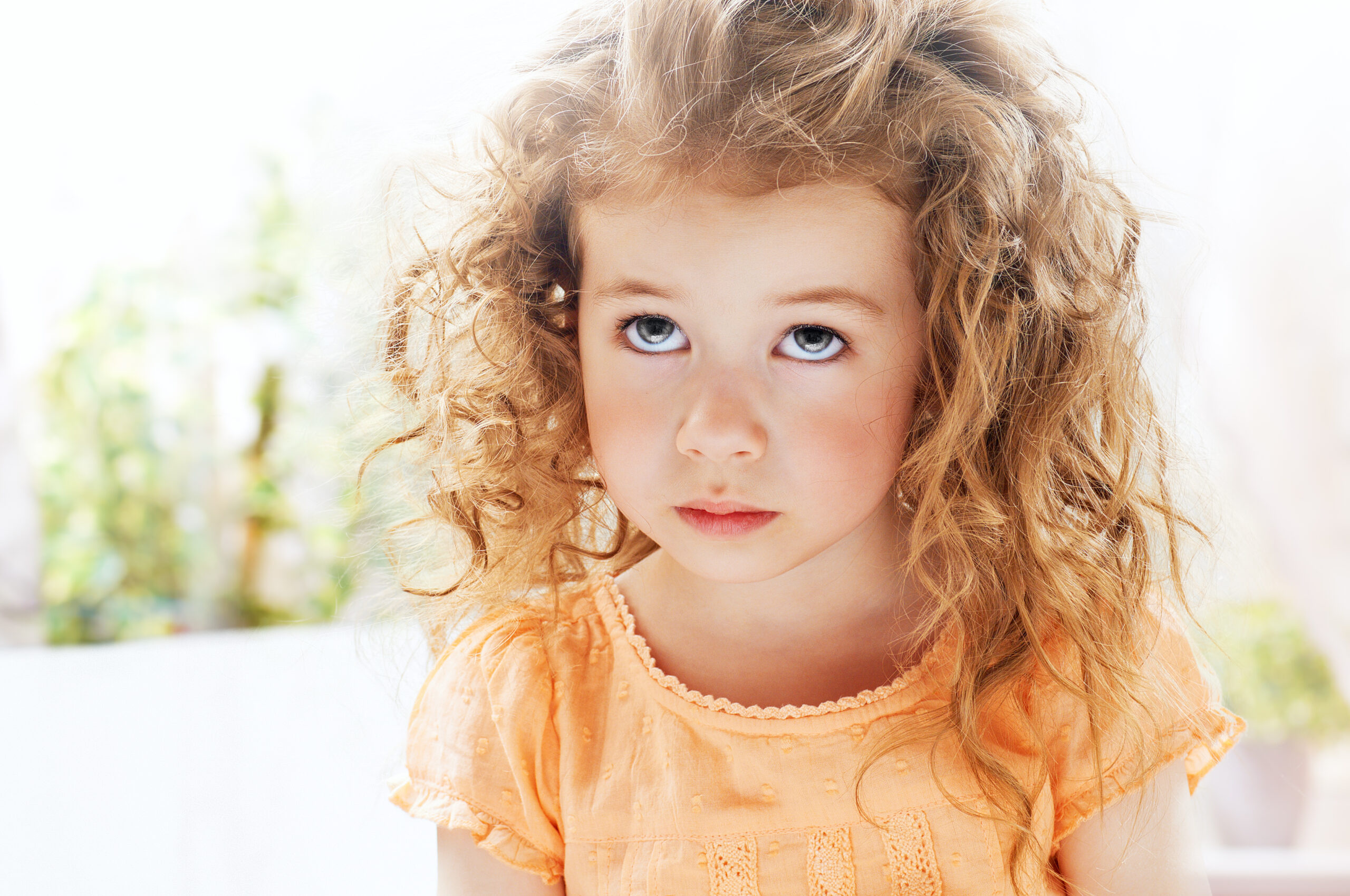 A sensitive young girl at the playground.