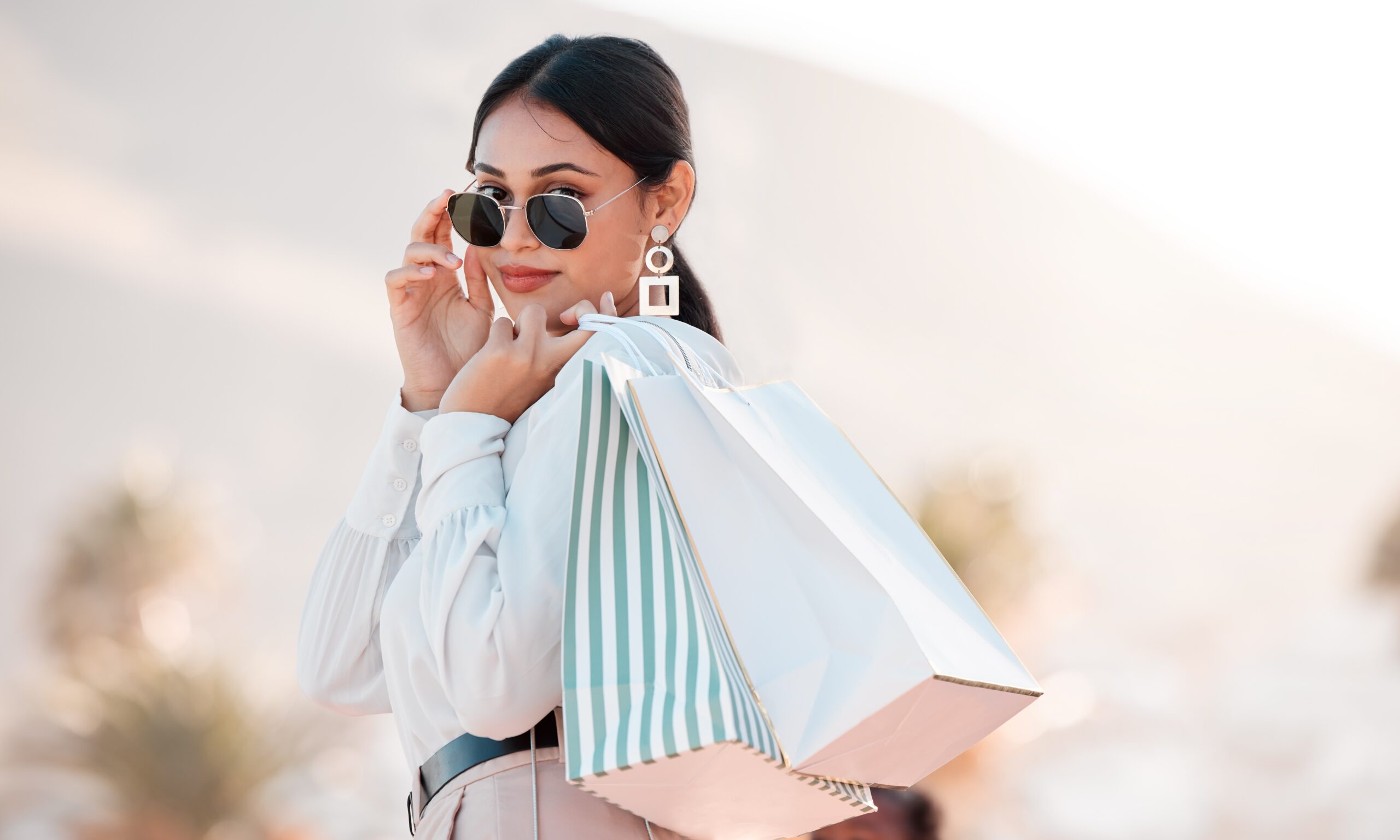 A wealthy woman doing luxury shopping.