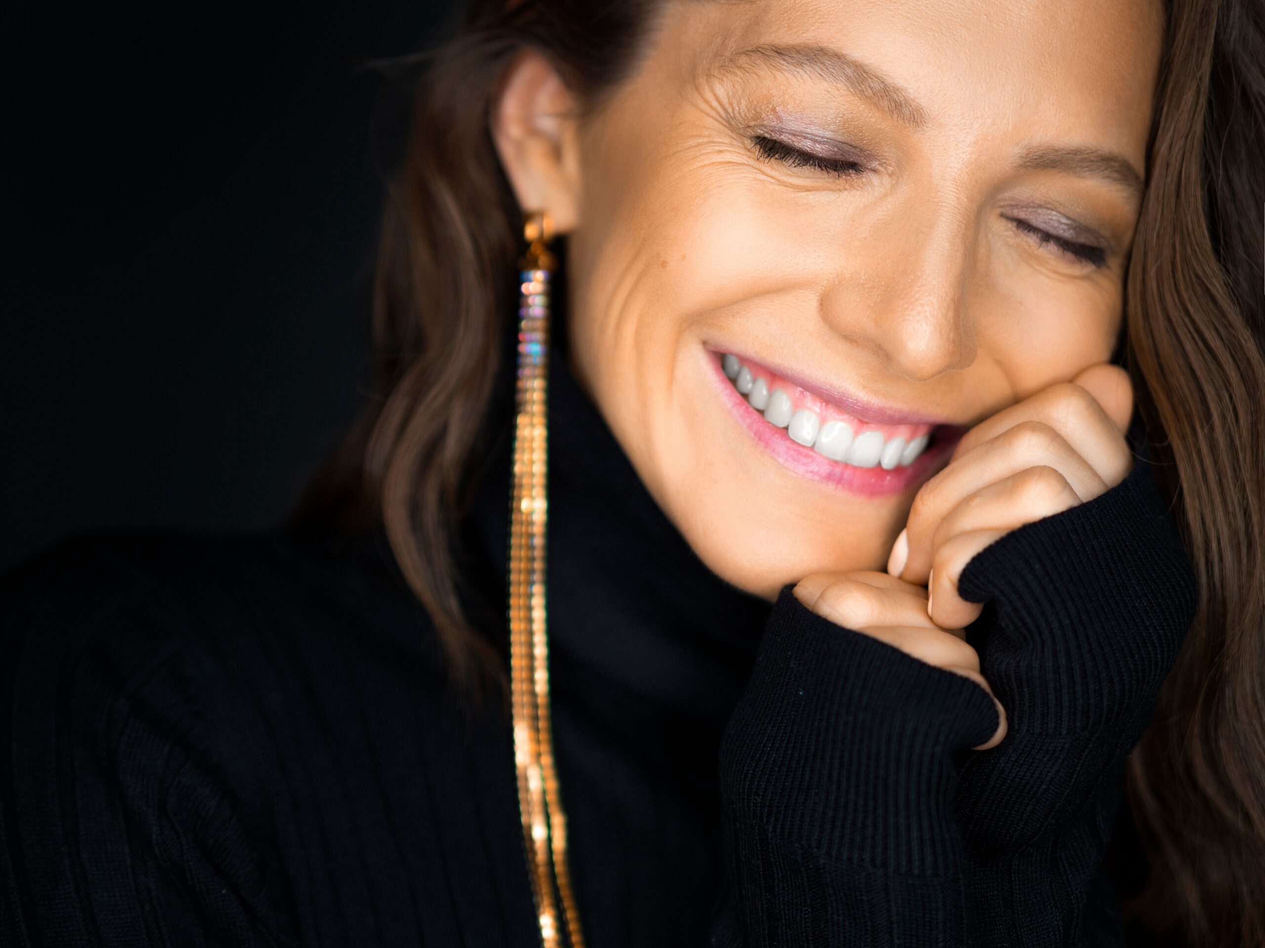 Confident and happy woman smiling.