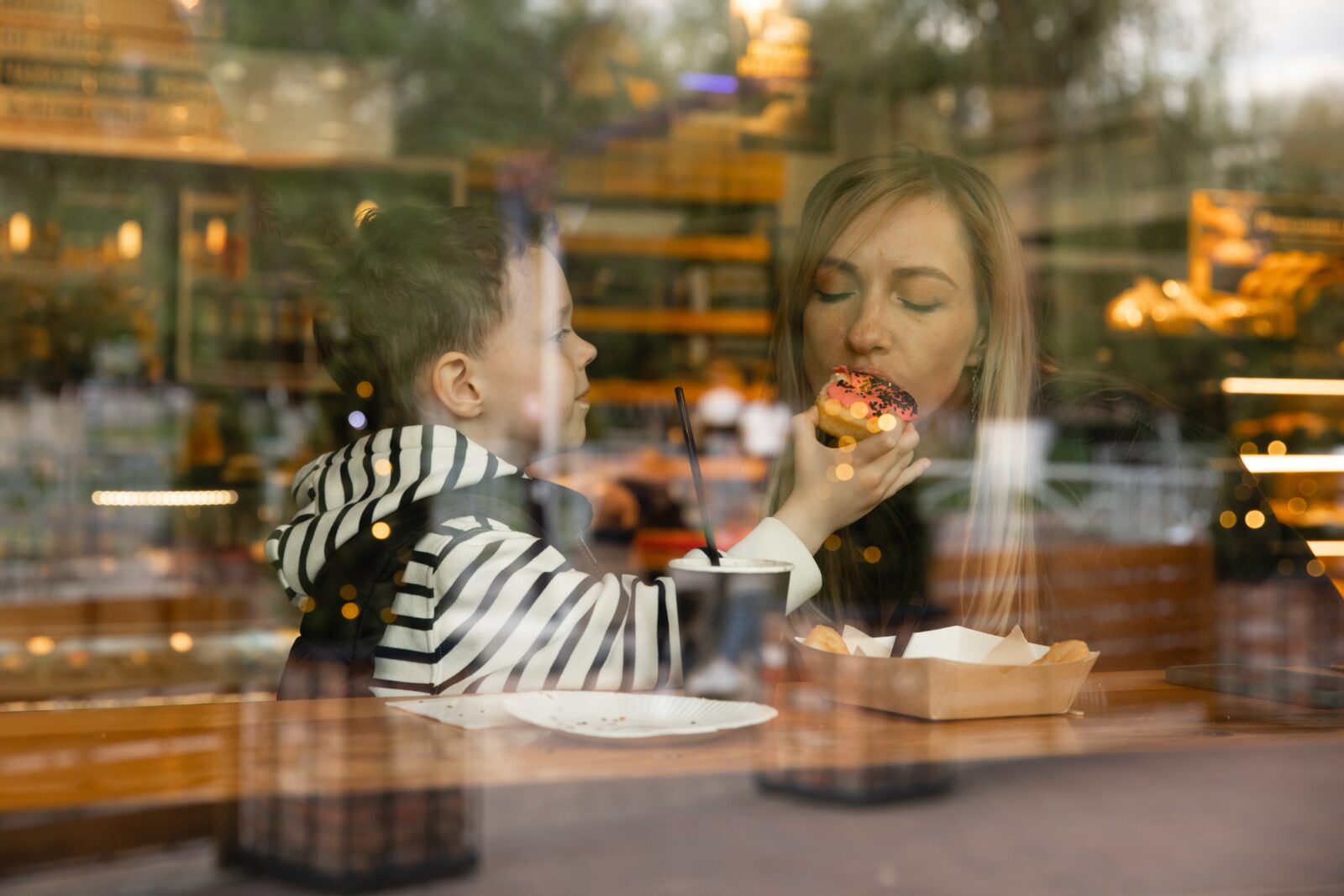 Mom and so spending time together at cafe.