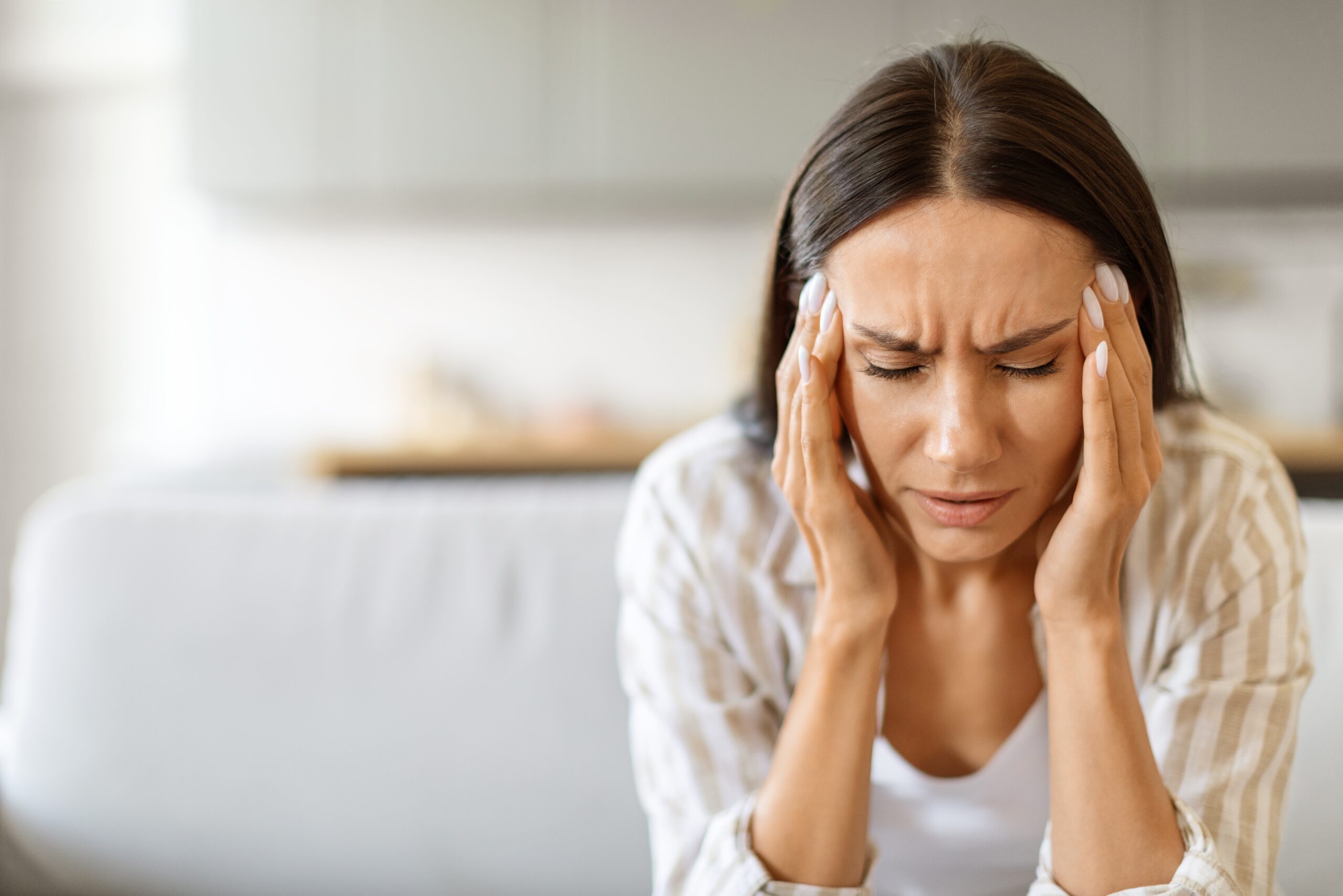 A woman in distress thinking about where her life is at.