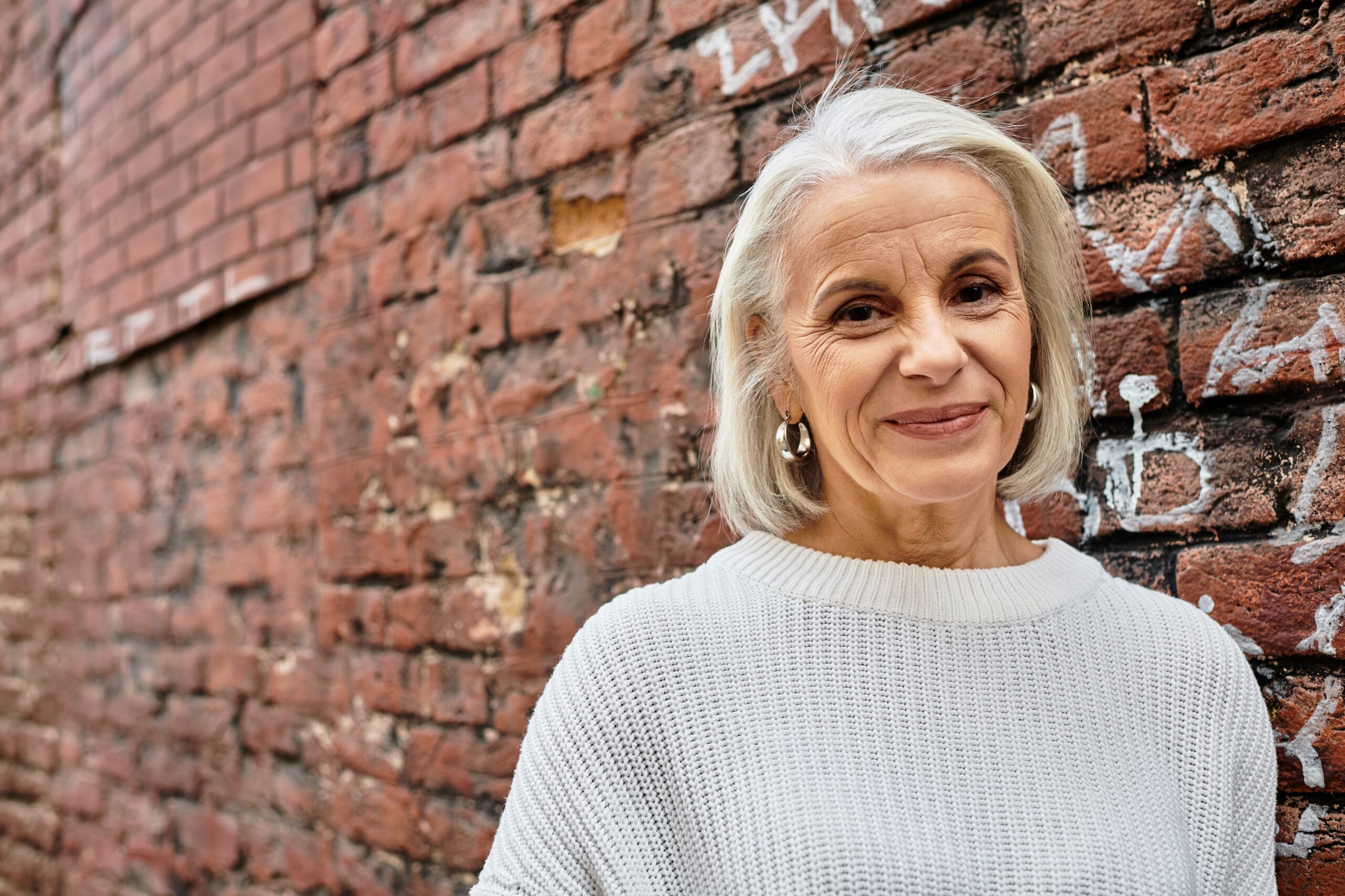 A confident mature woman out on a walk.