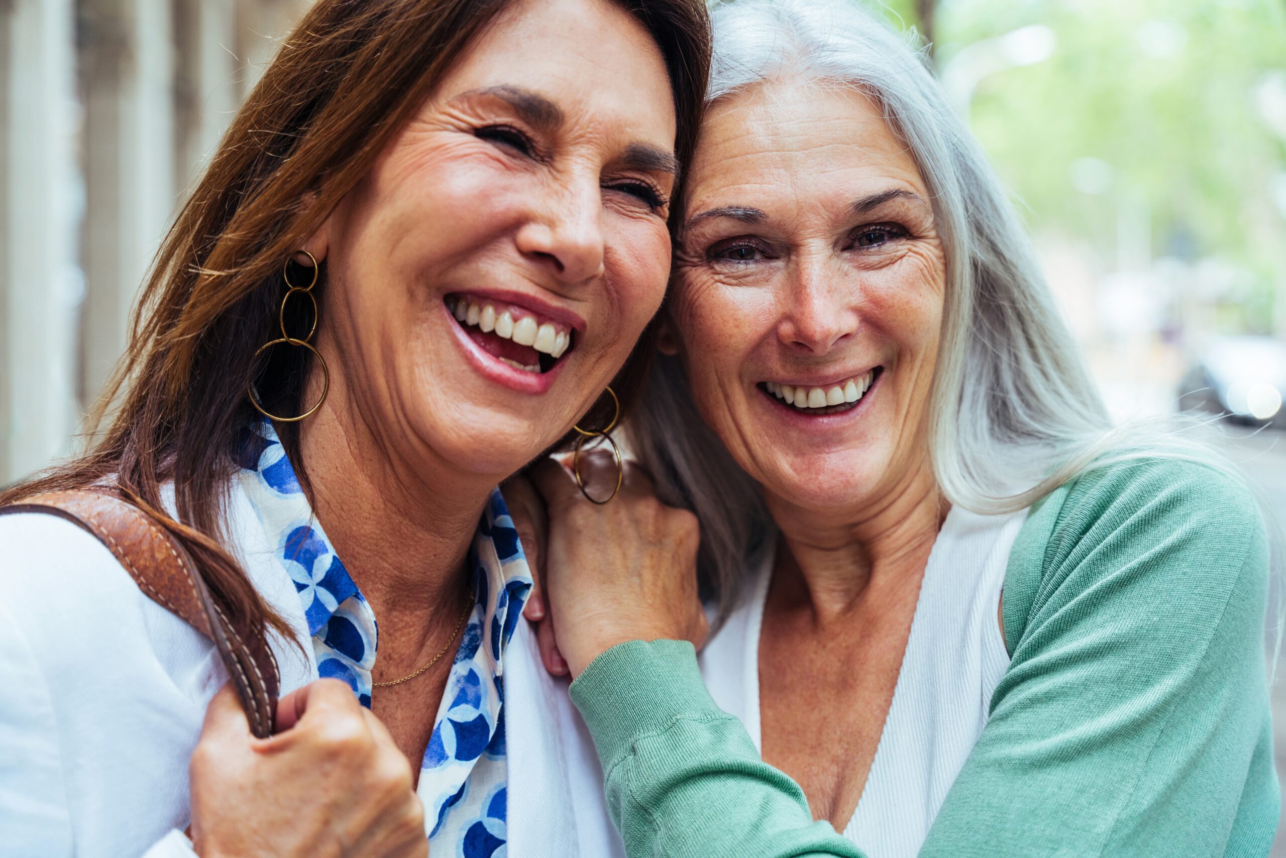 Two mature women reliving their childhood memories together.