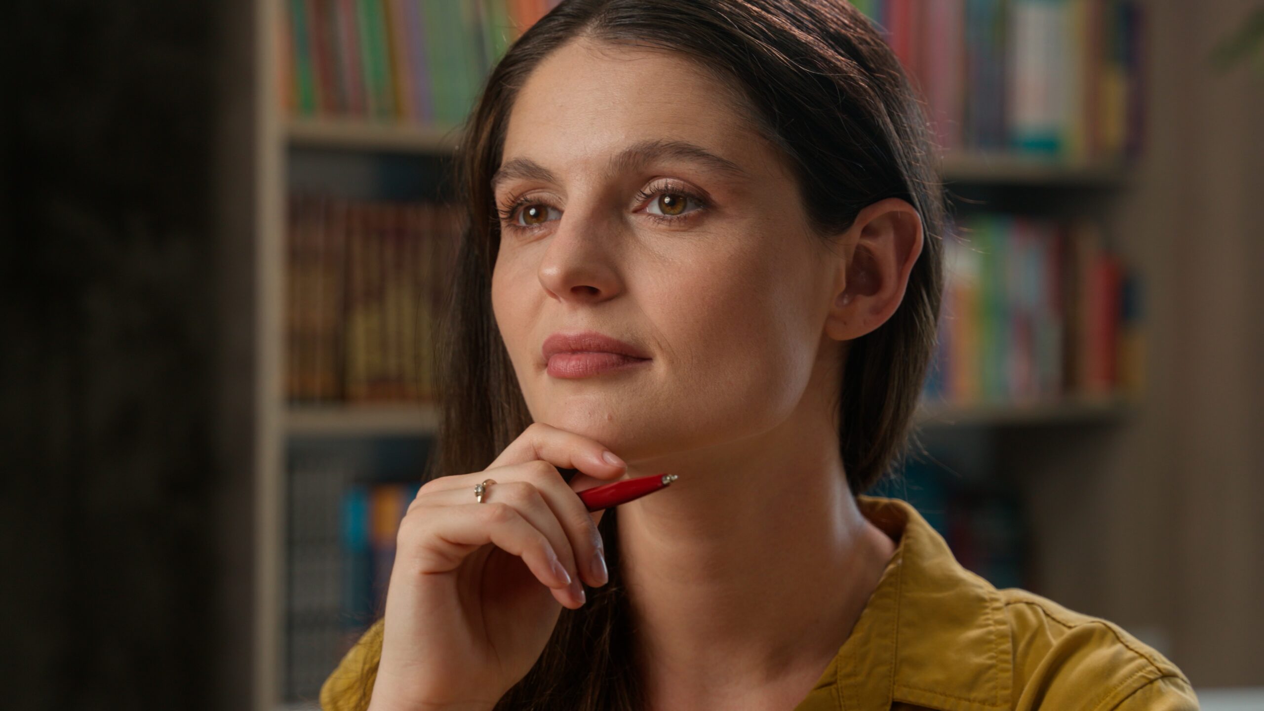 Smart woman looking pensive.
