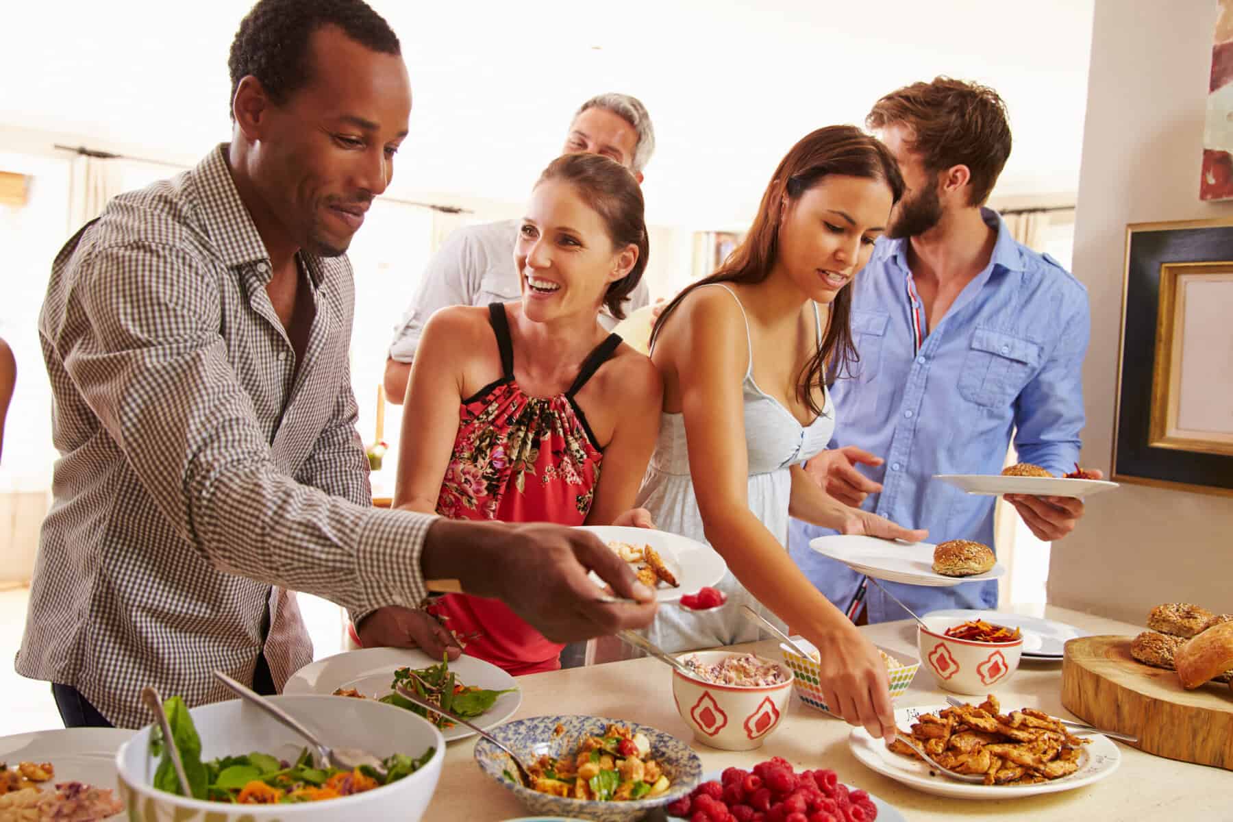 An extended family gathering for a meal.