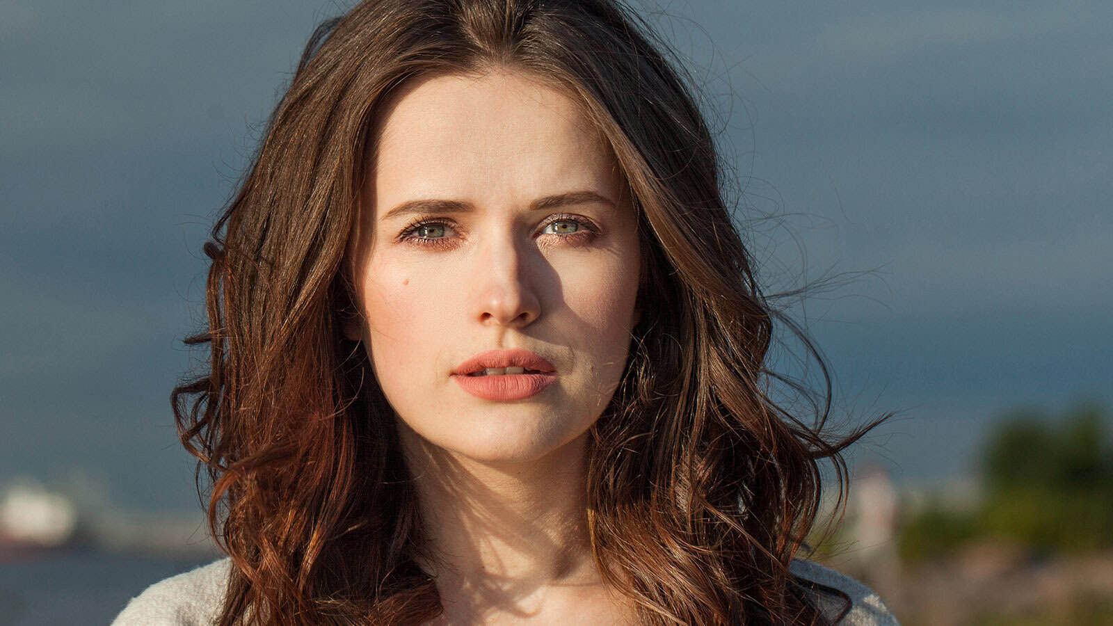 emotional moody woman staring into camera intensely