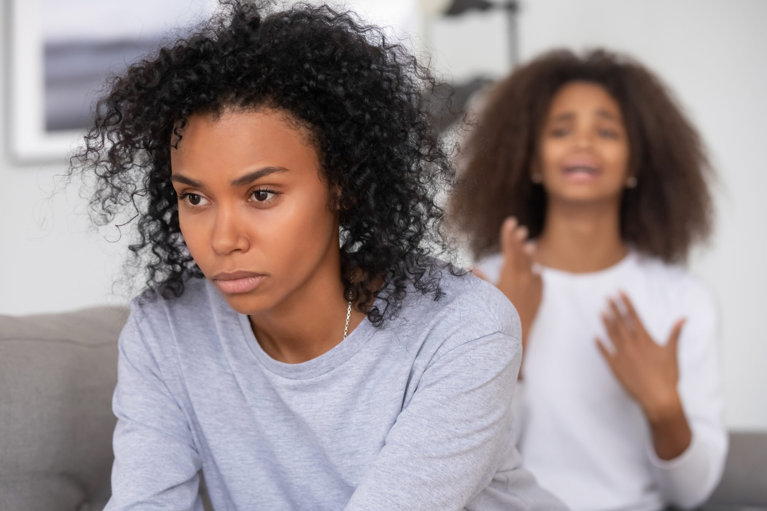 A teenager having an argument with her insensitive mother.