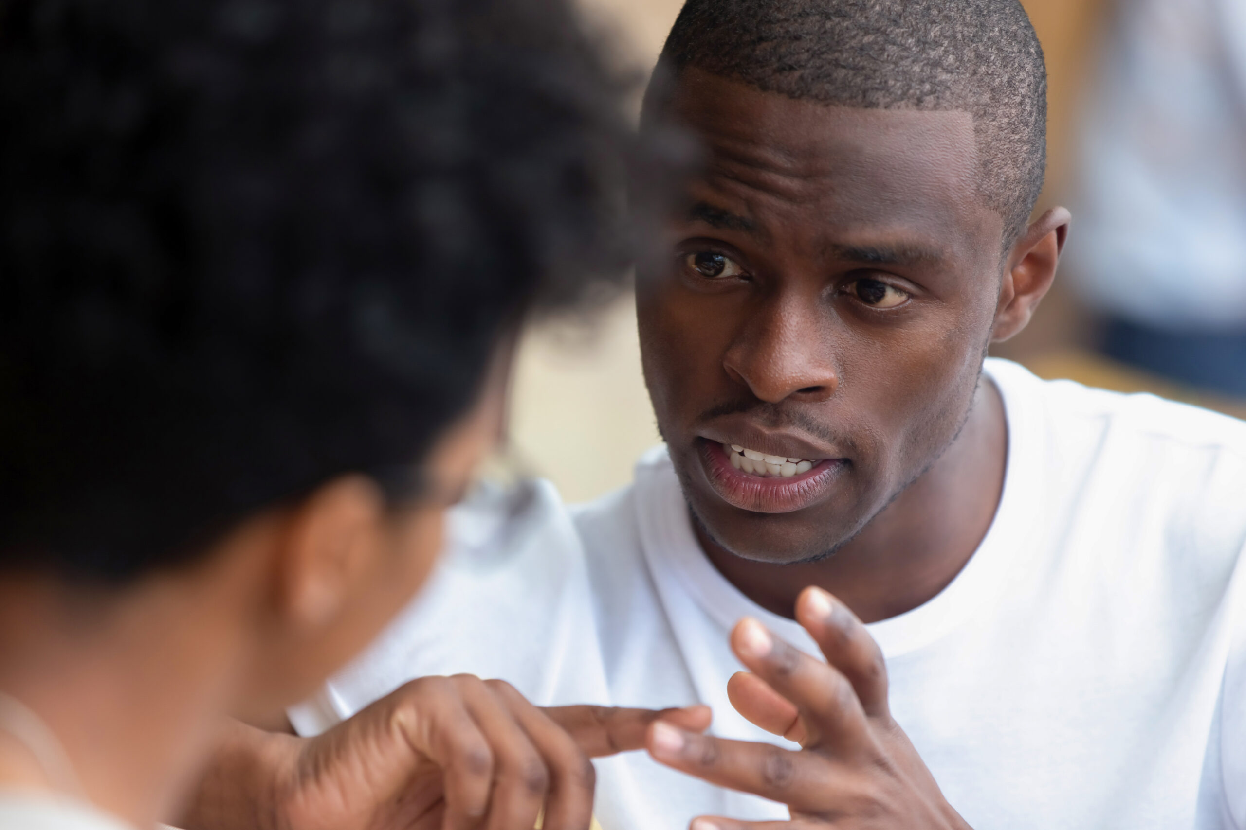 Two male friends speaking honestly about something important.