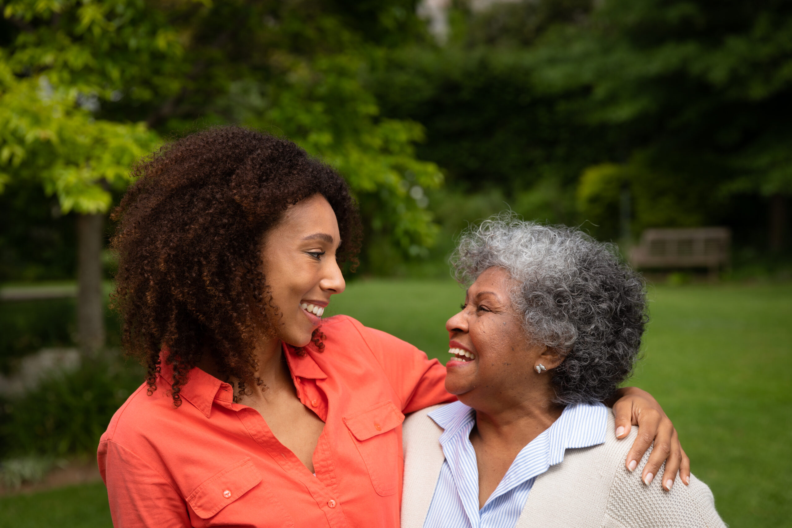 A senior mother enjoying time with her adult daughter.