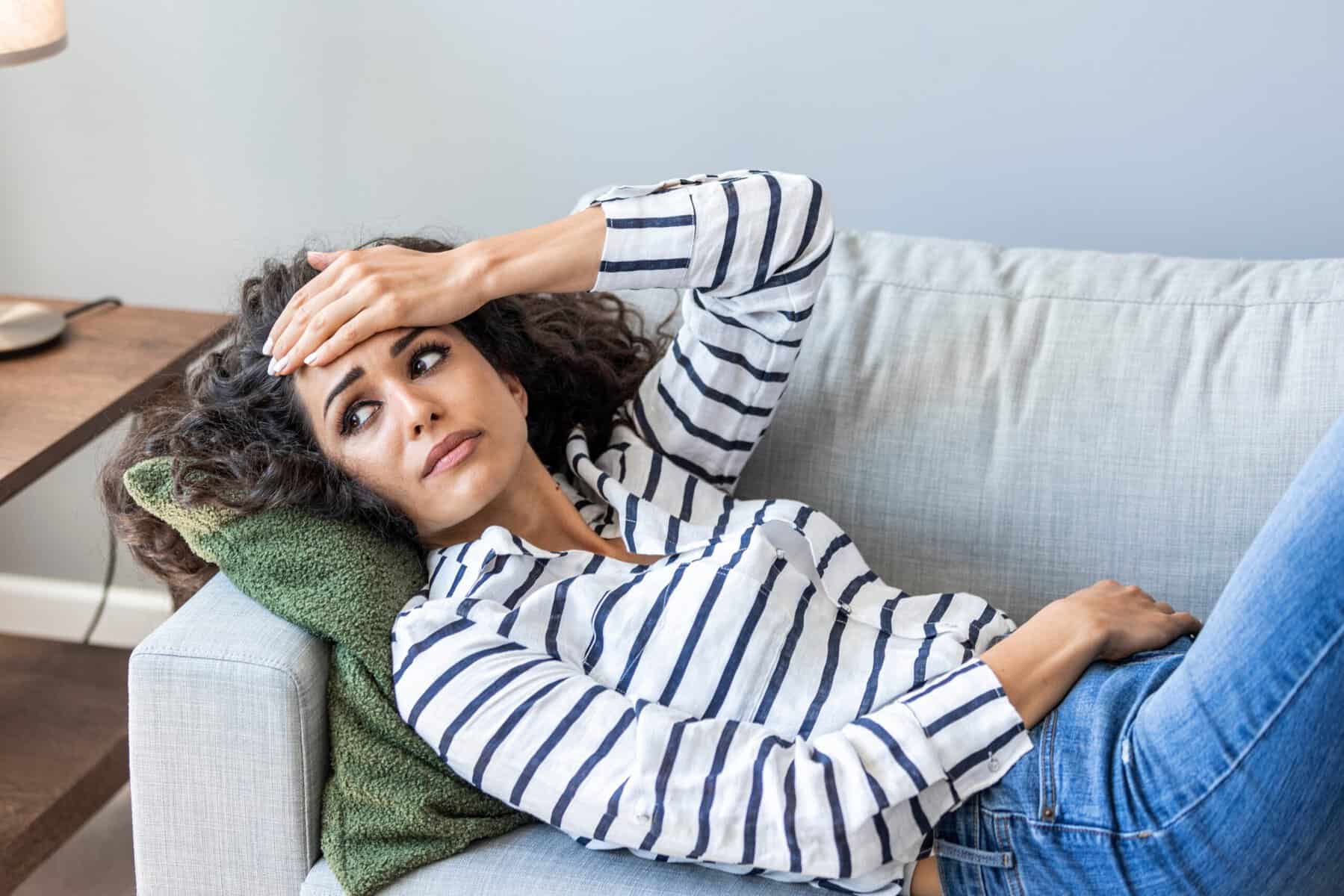 A woman feeling guilt over resting on the weekend.