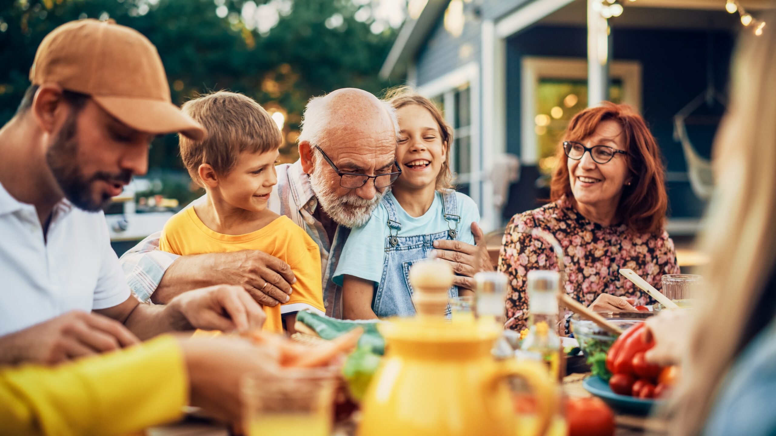 An extended family sharing a meal together.