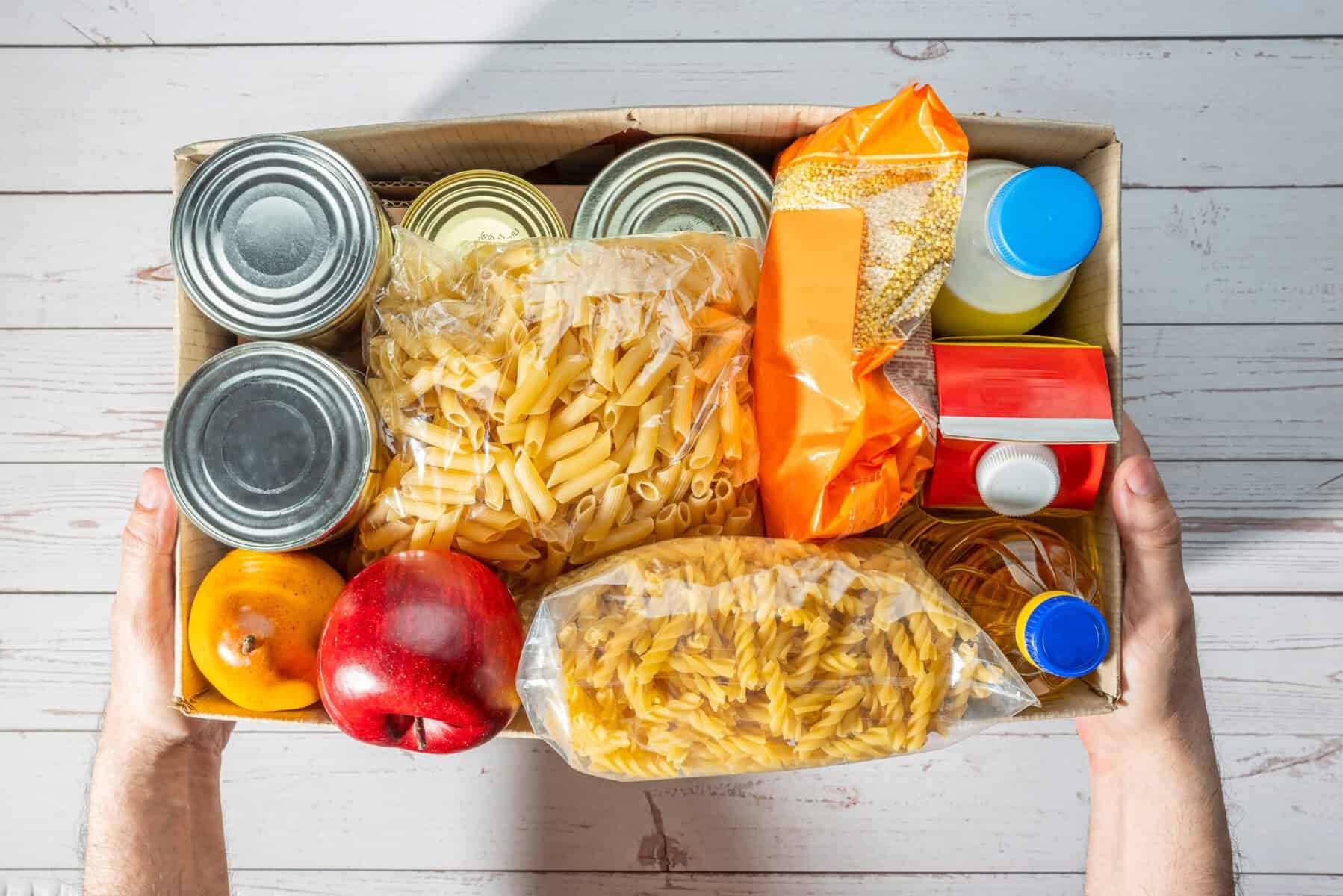A volunteer at a free food distribution and help center.
