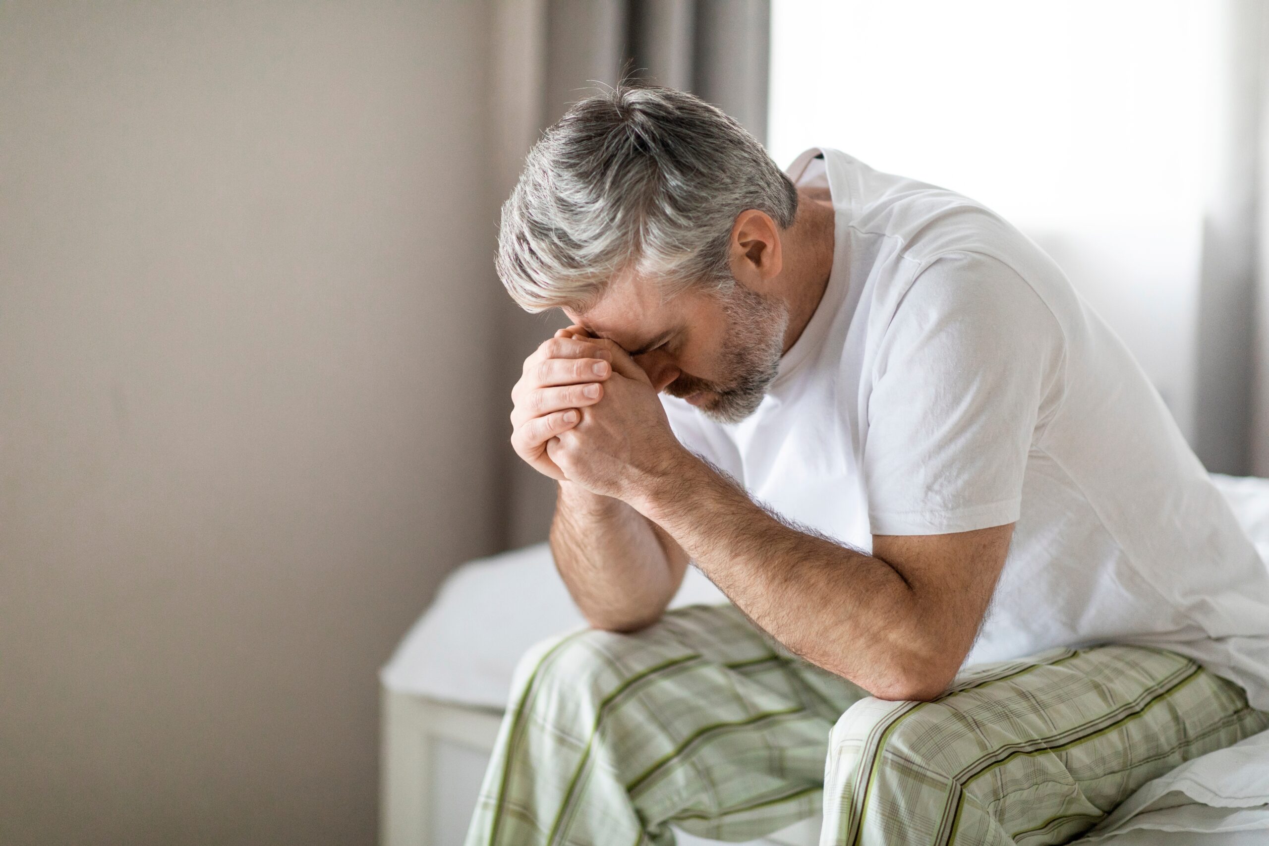 A middle aged married man feeling lonely.