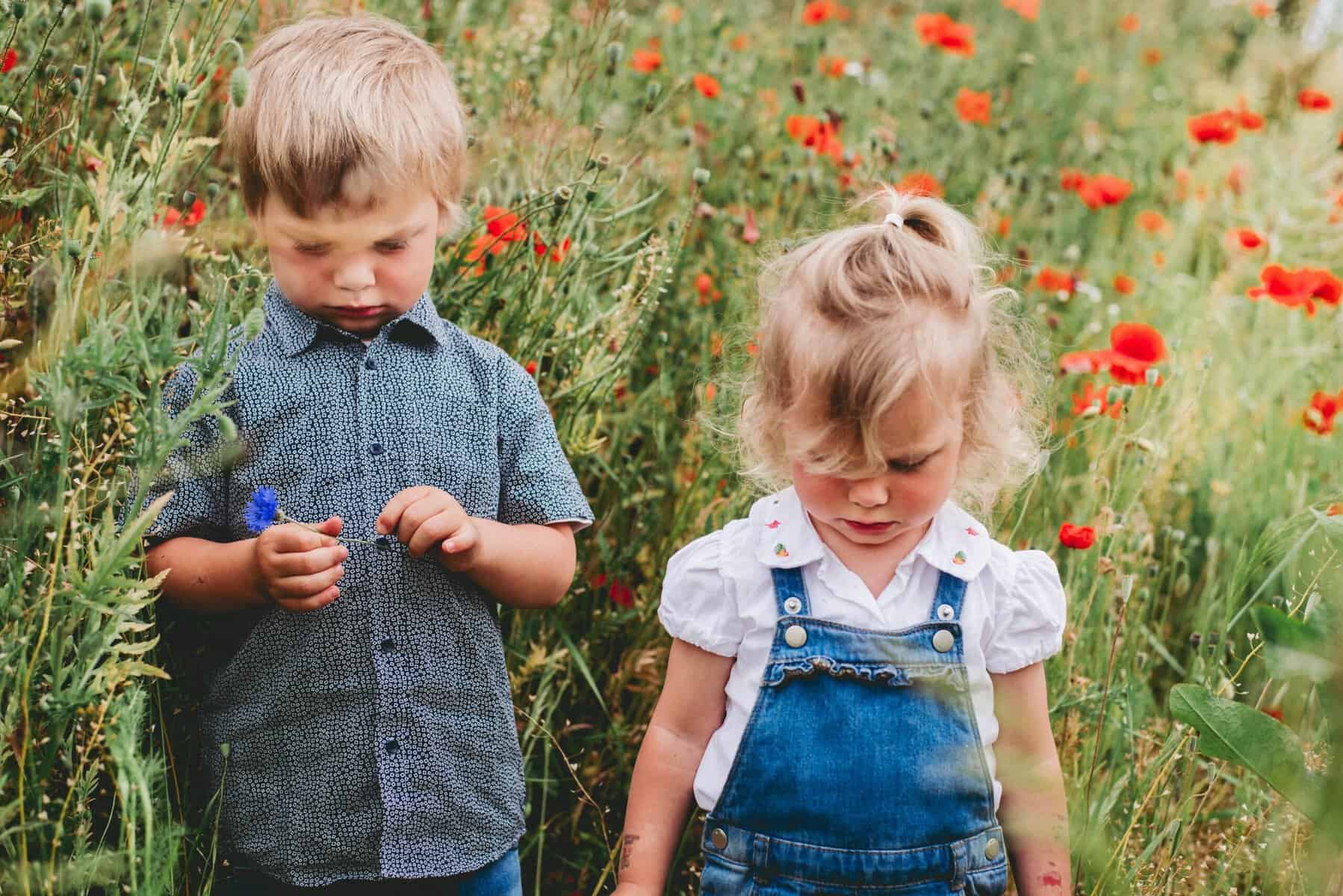 Young siblings alone on a walk.