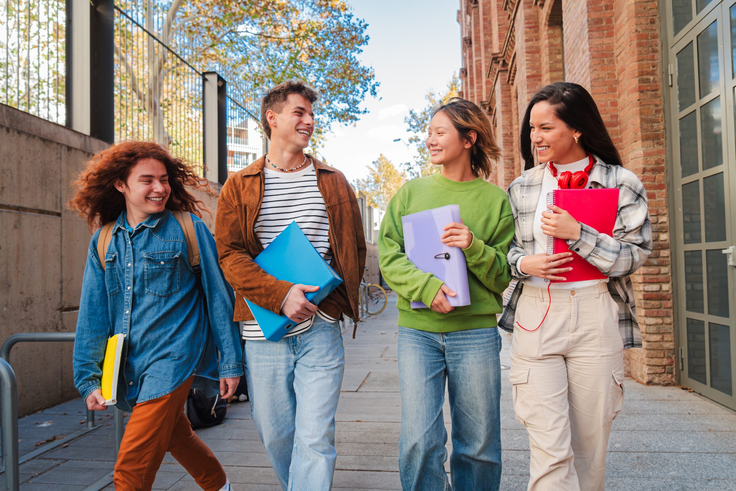 A group of high schoolers walking together after class.