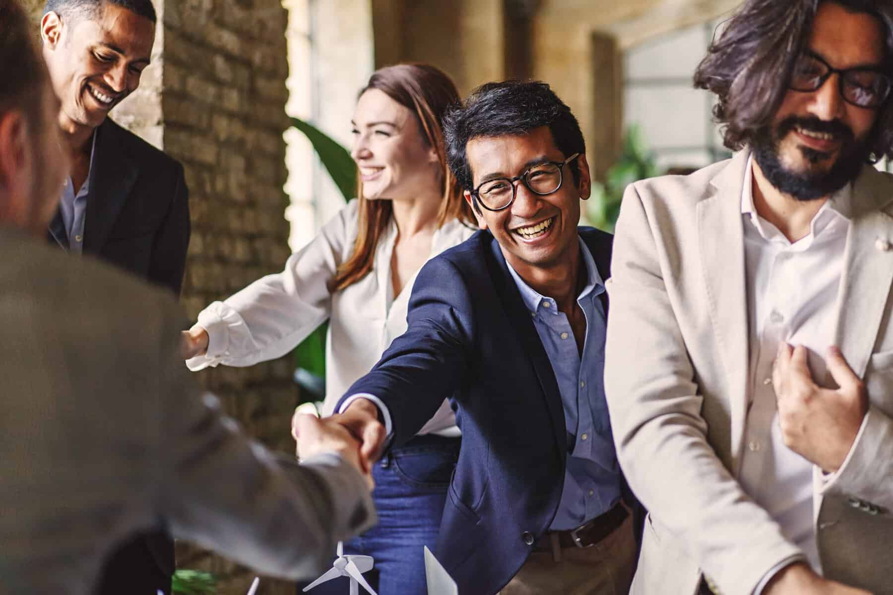 A group of people engaging in small talk at a networking event.