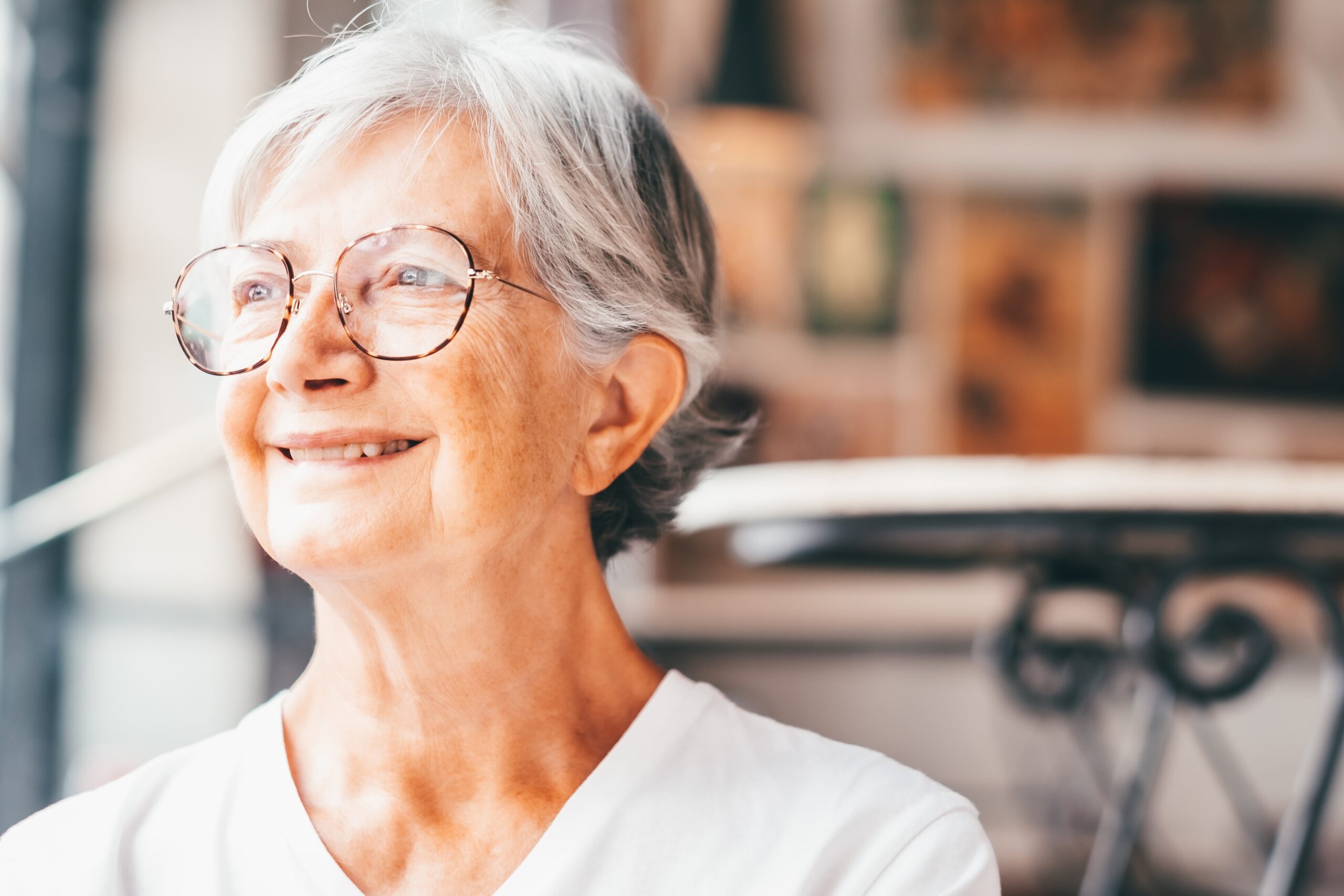Senior woman walking confidently on the city streets.