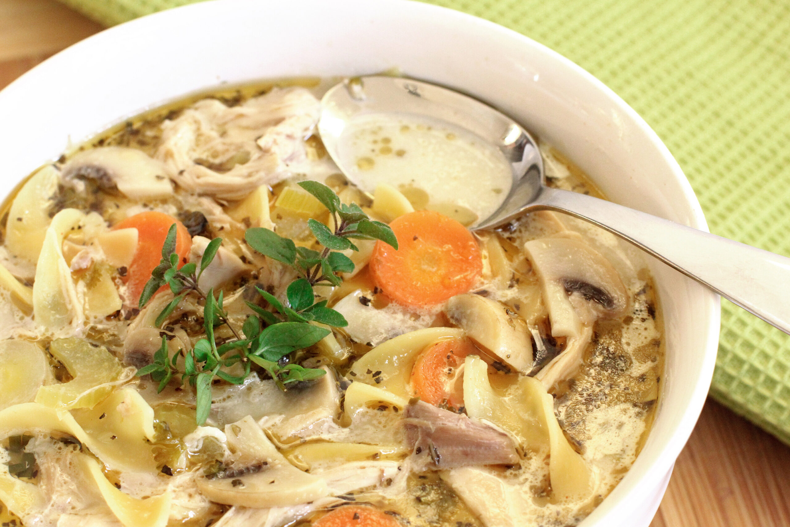 A bowl of homemade chicken noodle soup.