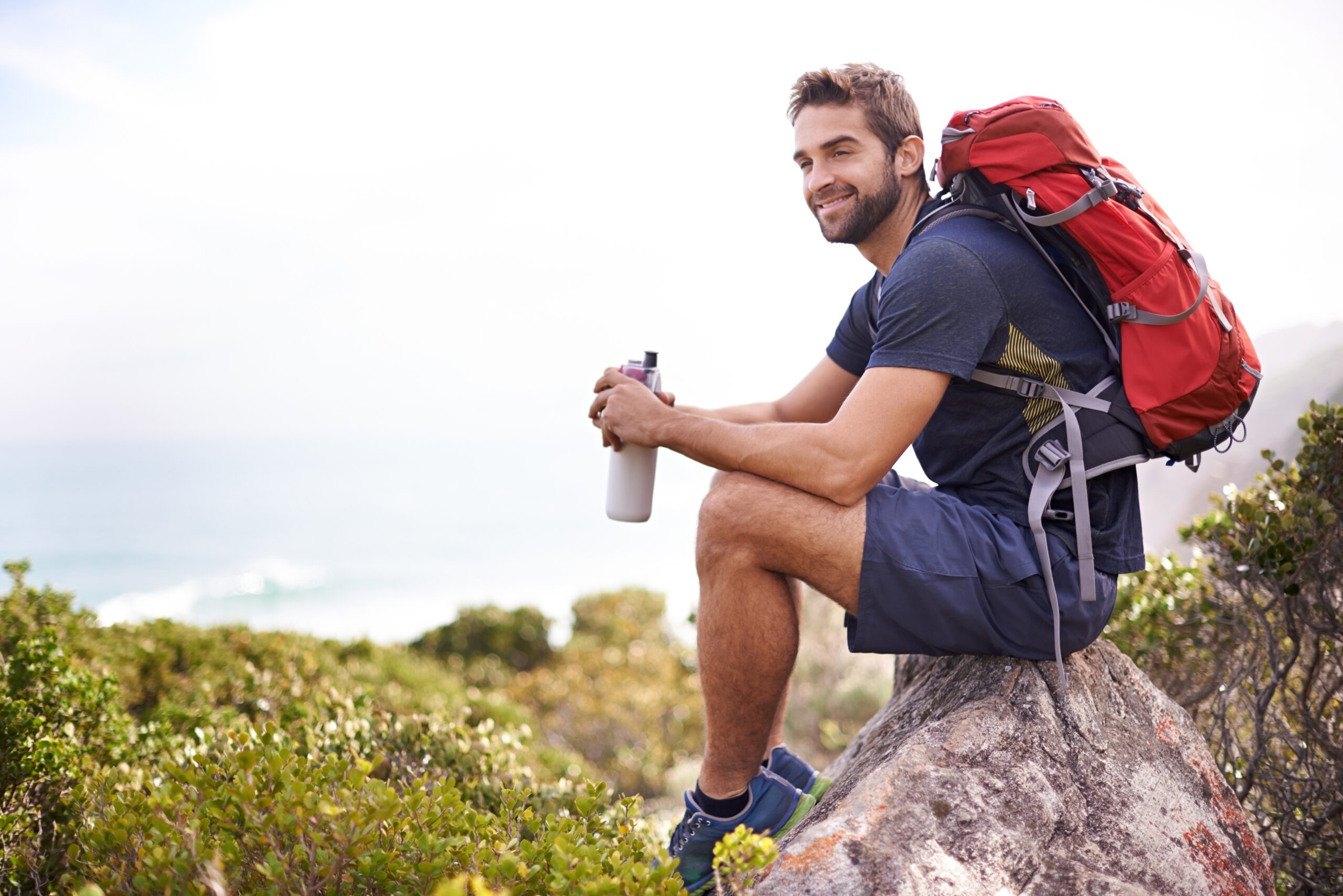 A man on a solo hike in the mountains.