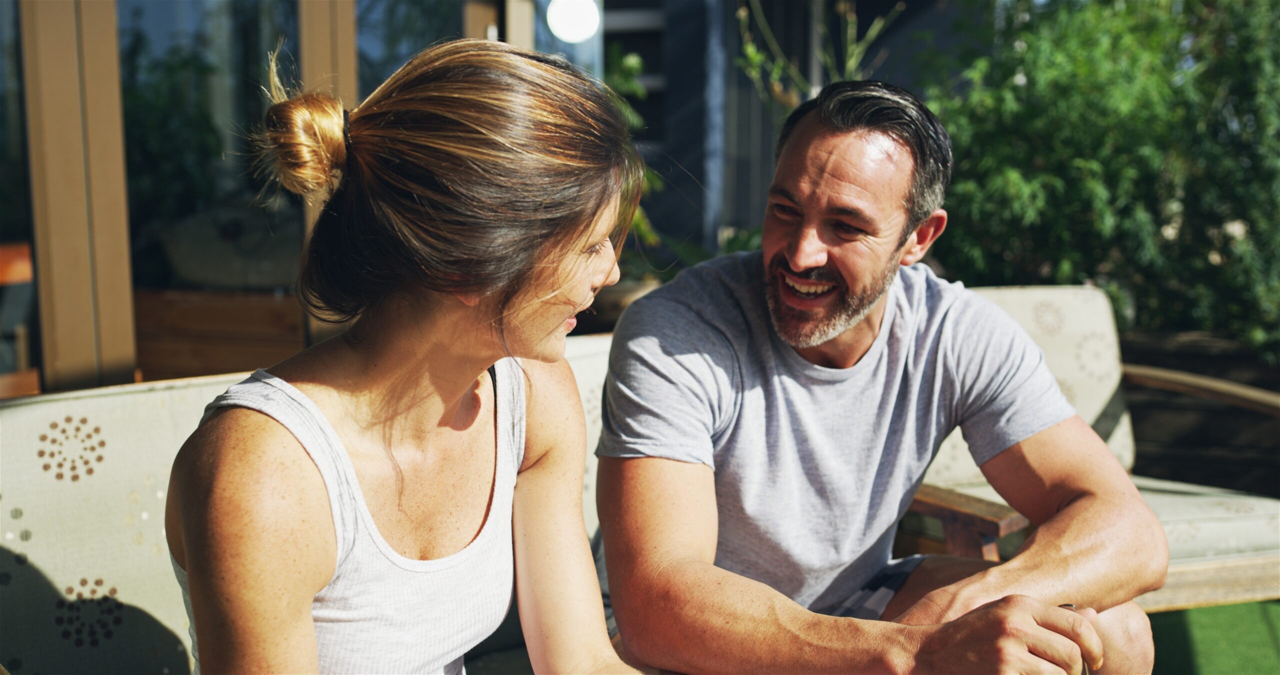 A happy couple enjoying time together outdoors.