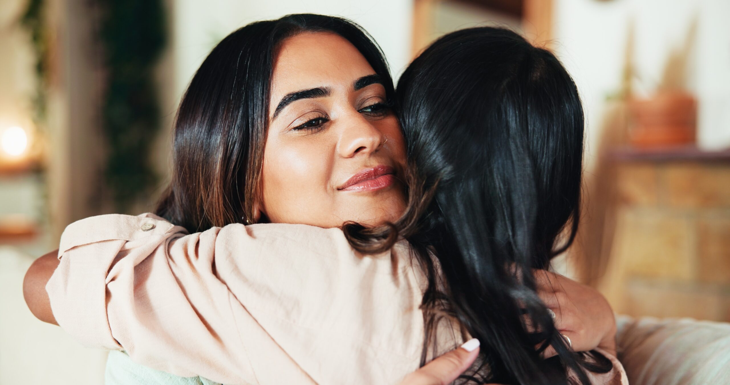 A woman sharing the news of her success with her friend.