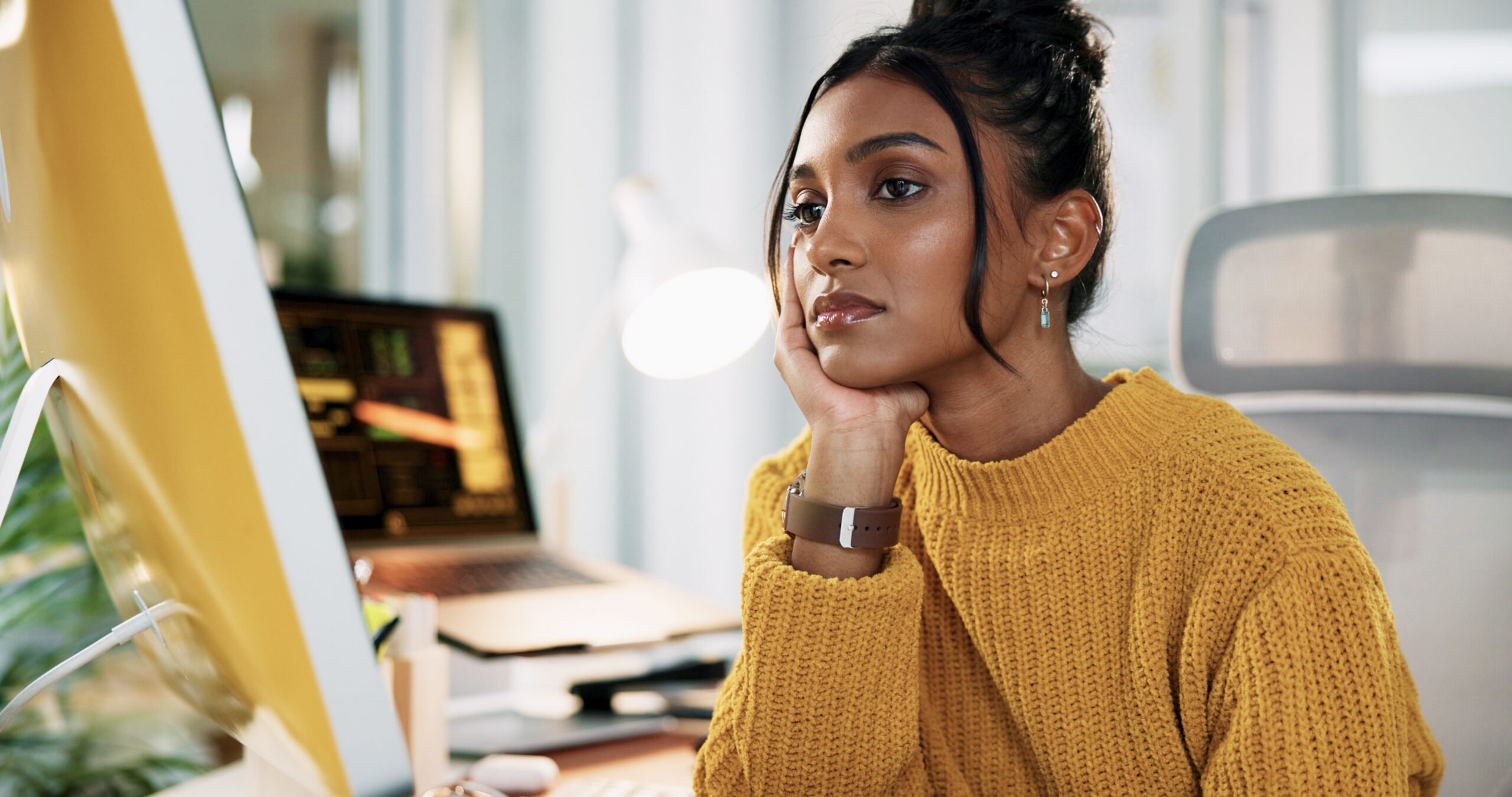An independent career woman at her computer.